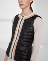Black quilted vest with contrasting beige