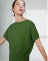 Green sweater with bat sleeves