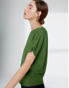 Green sweater with bat sleeves