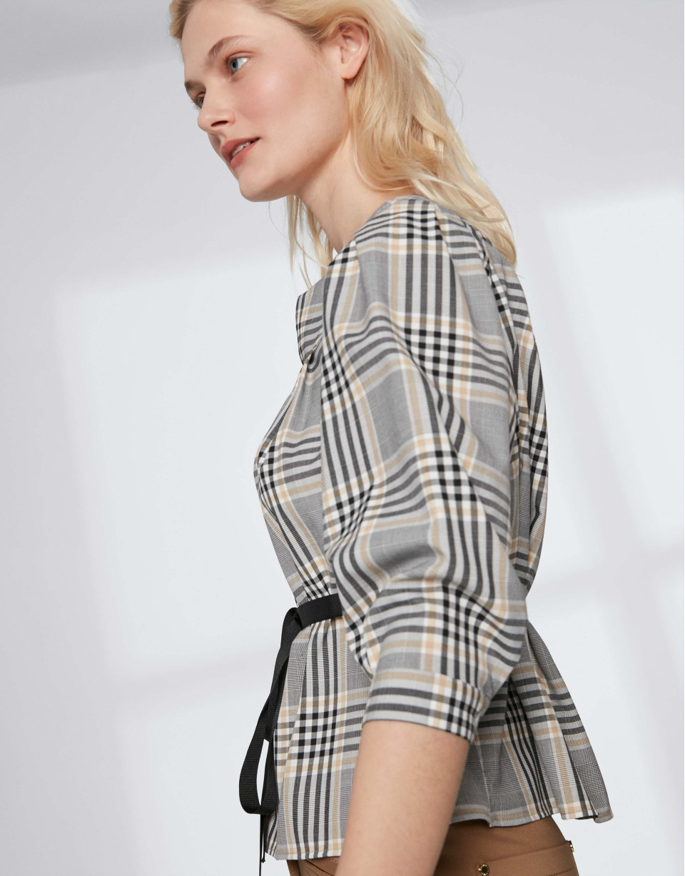 Checked blouse with boat neck and belt