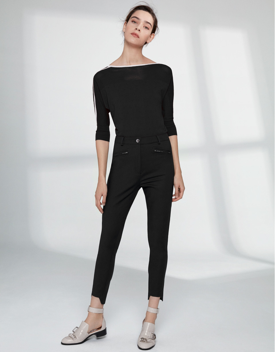 Pantalón pitillo negro bajo irregular
