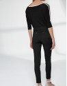 Pantalón pitillo negro bajo irregular