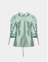 Pastel green silk blouse with puckered sleeves