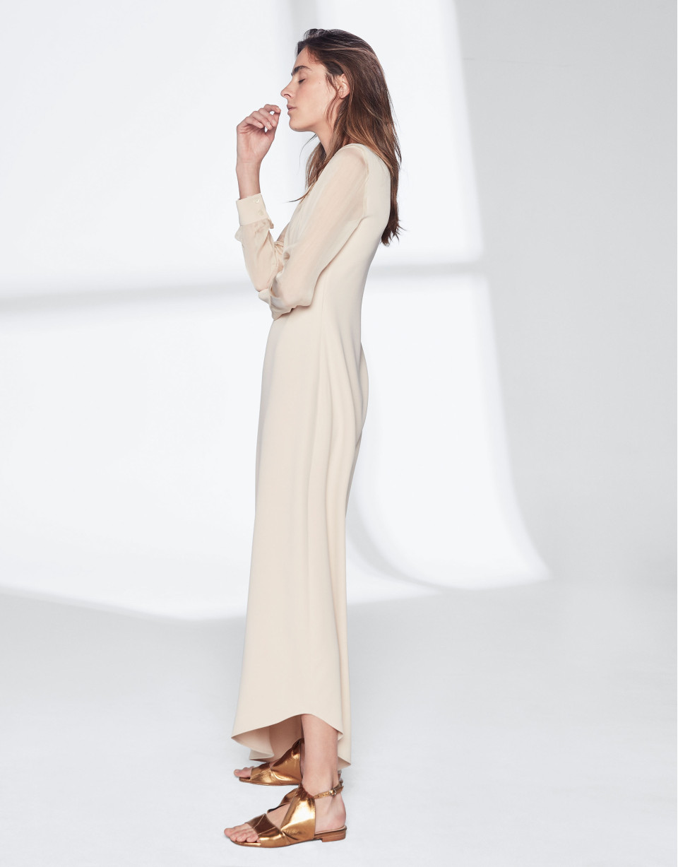 Sandy-colored dress with asymmetric hem