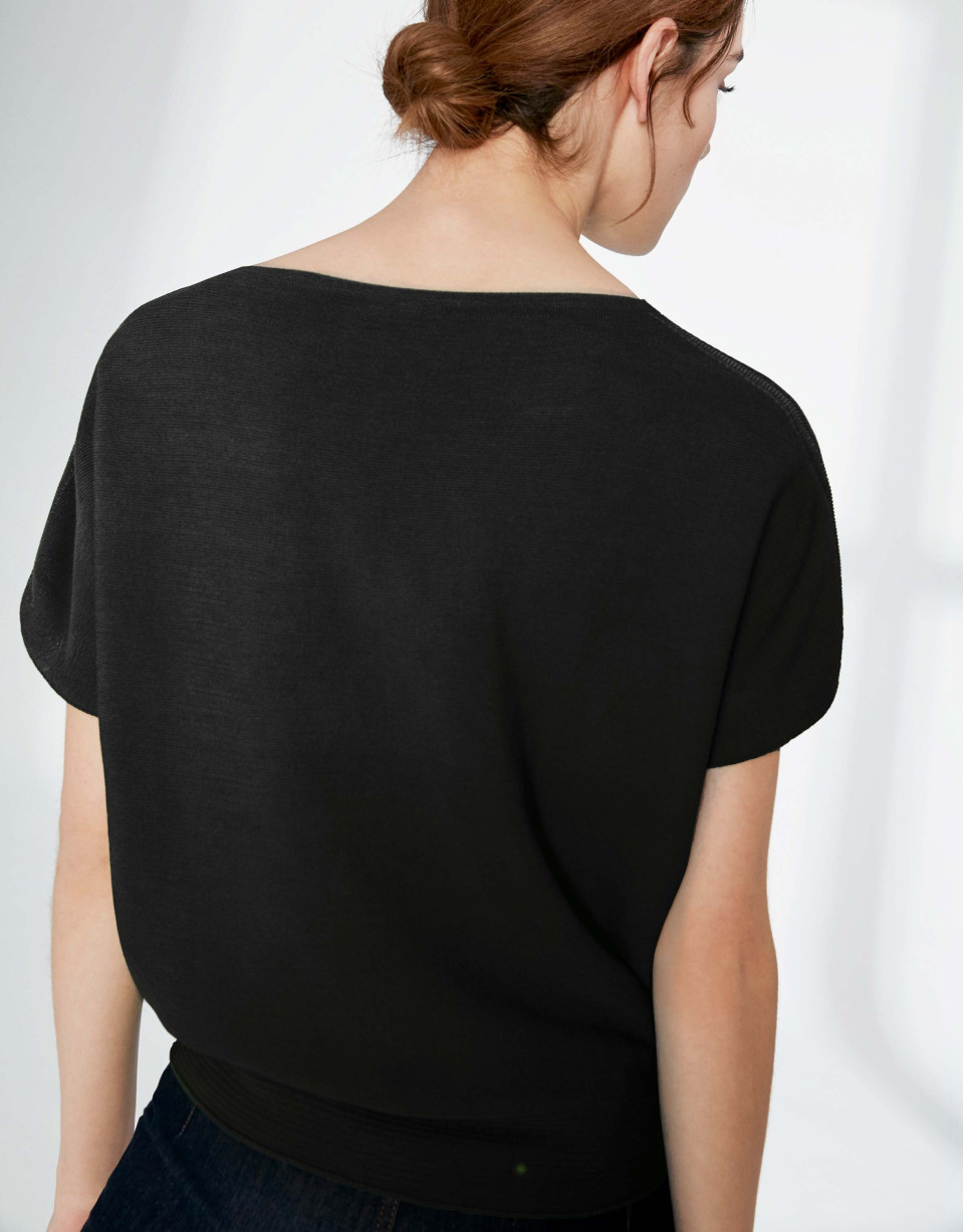 Black sweater with bat sleeves