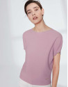 Pink sweater with bat sleeves