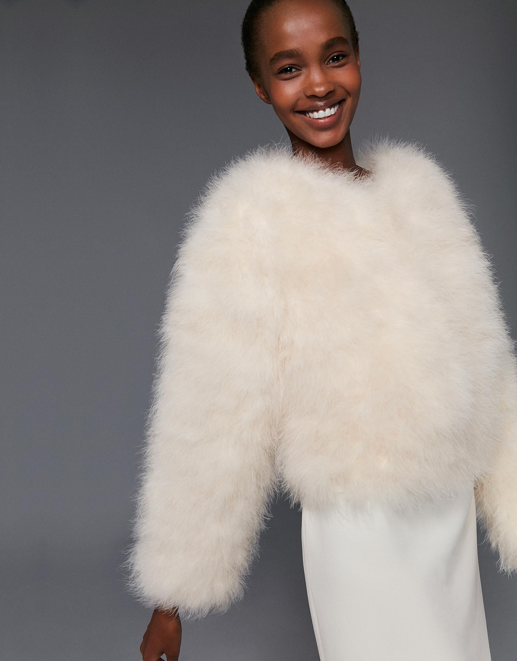 Chaqueta oversize pluma de pavo blanca