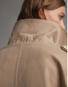 Short beige parka with double row of buttons