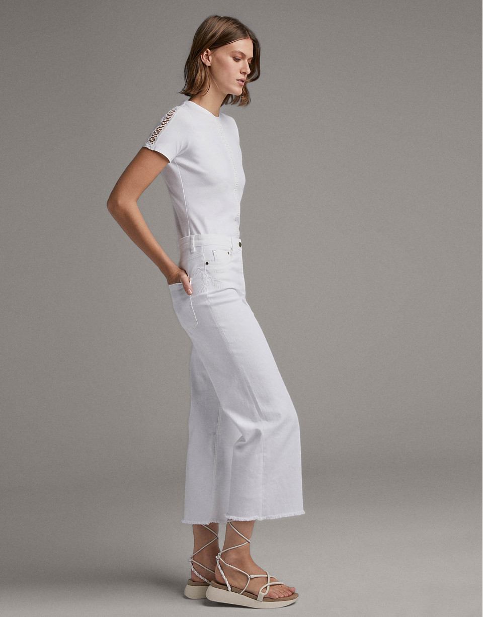 White, bell bottom jeans  - Woman - SS2020 | Roberto Verino