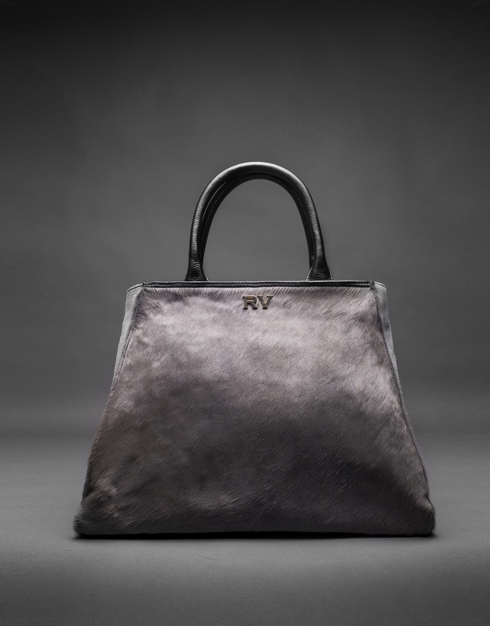 Bolso Justin con pelo de potro en gris combinado con piel y ante en negro