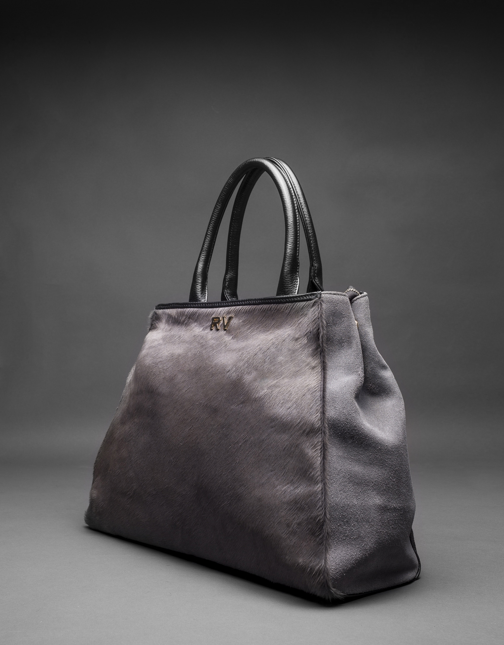 Bolso Justin con pelo de potro en gris combinado con piel y ante en negro