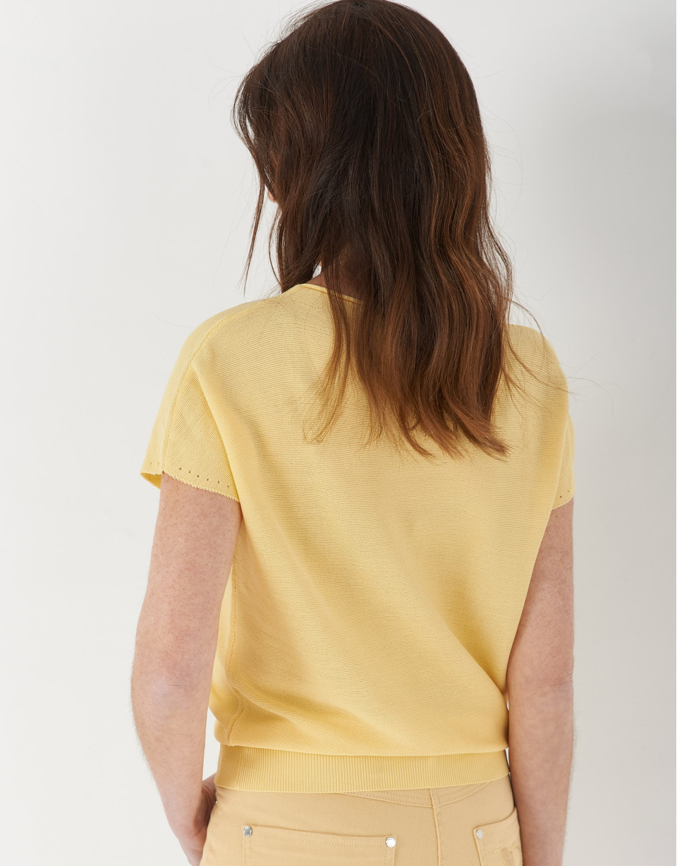 Yellow knit sweater with bat sleeves