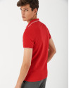 Red pique cotton polo shirt with white outlines