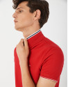Red pique cotton polo shirt with white outlines