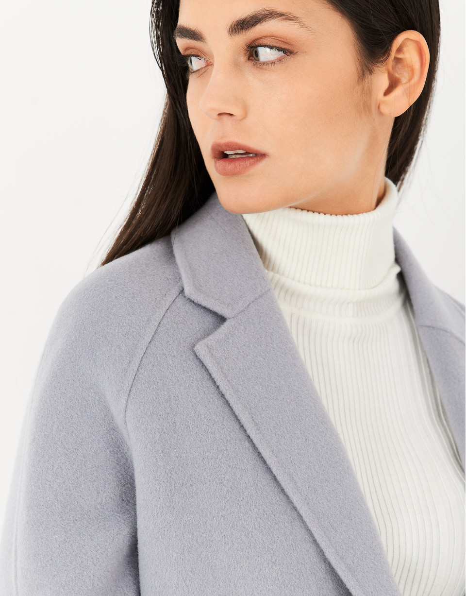 Short blue coat with double row of buttons | Roberto Verino