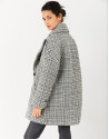 Short oversize coat with black and white checked pattern