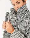 Short oversize coat with black and white checked pattern