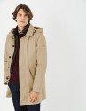 Sandy-colored minimal gabardine with brown windbreaker