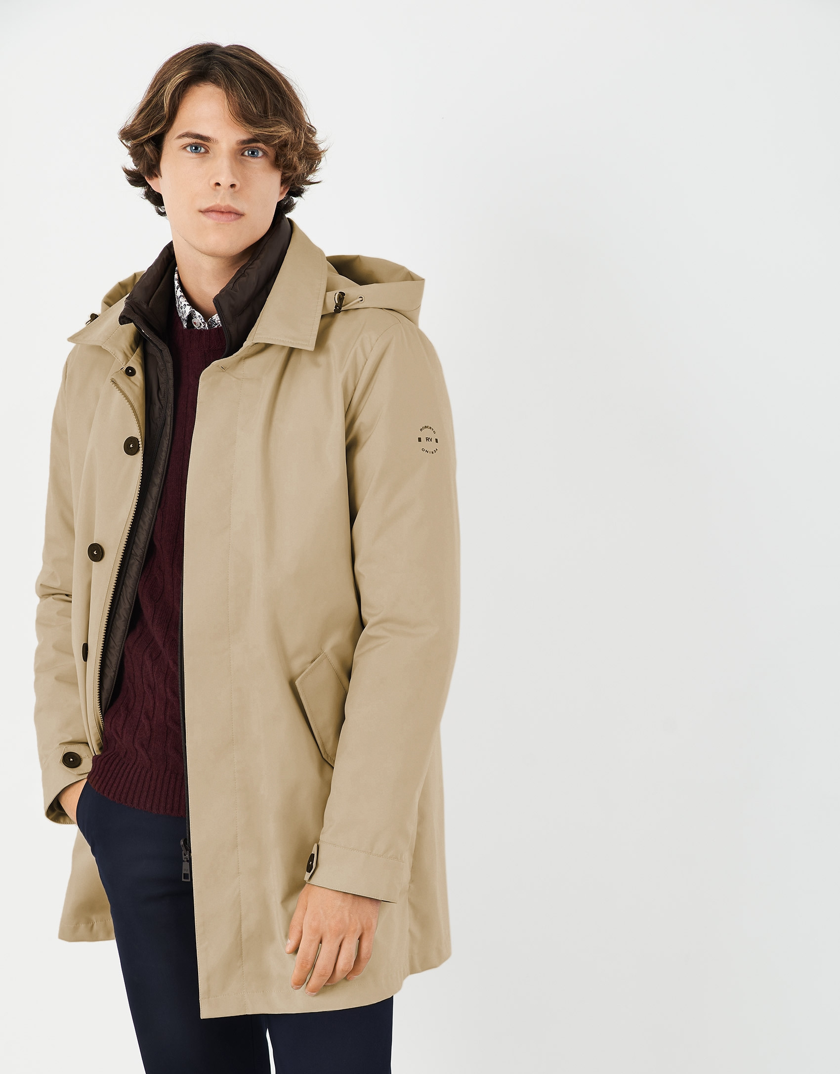Sandy-colored minimal gabardine with brown windbreaker