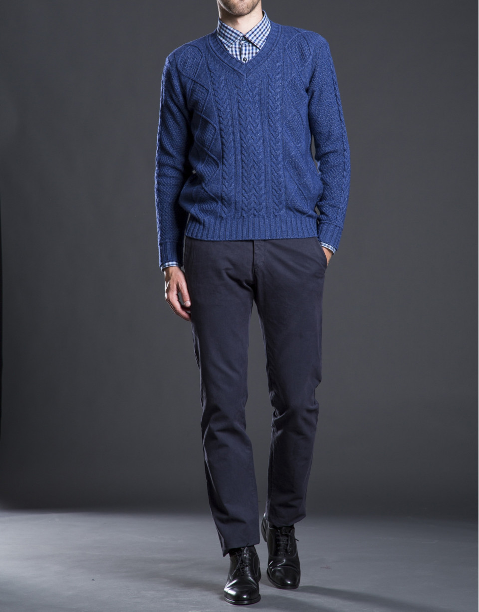 Blue V-neck sweater with cable stitch design 