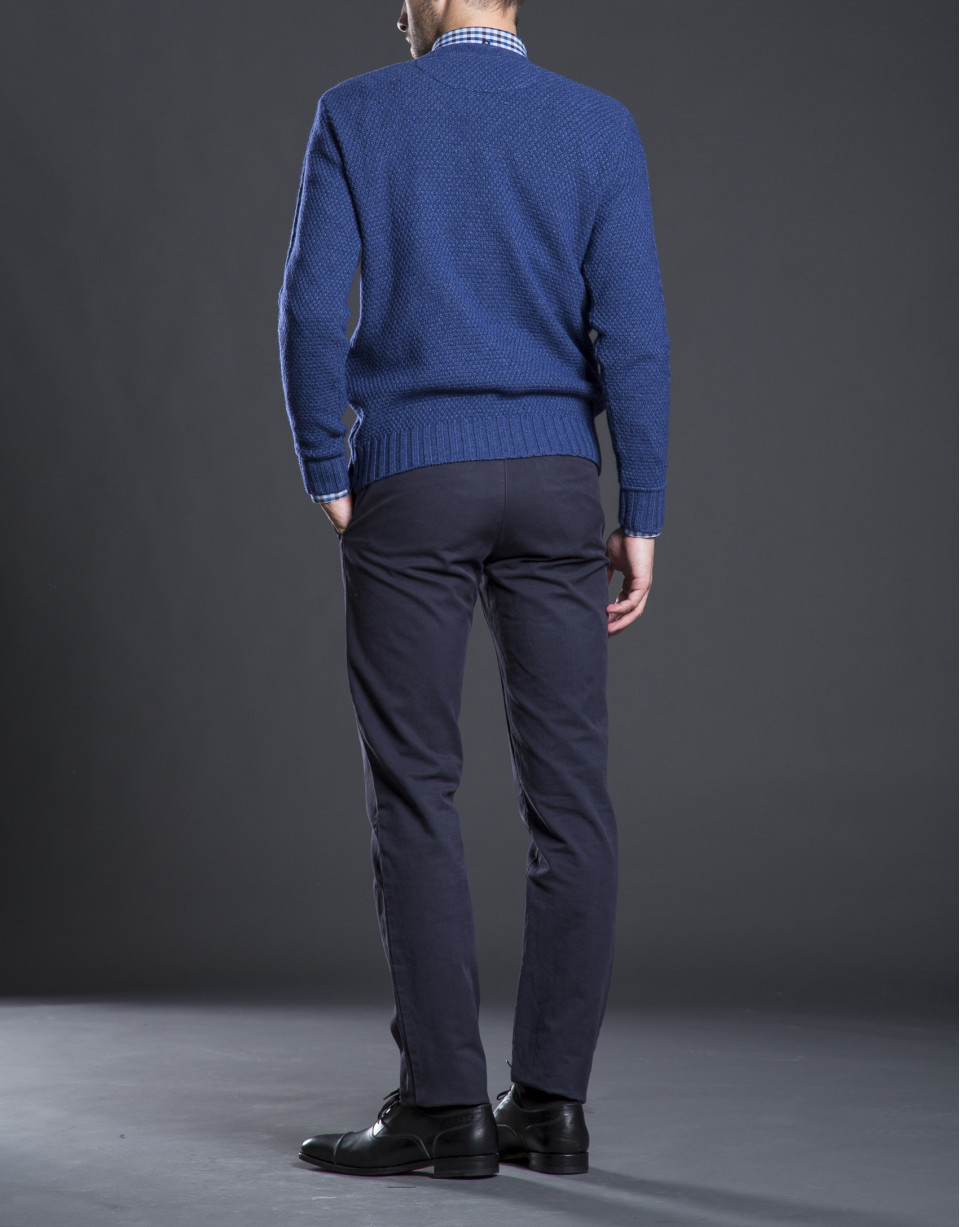 Blue V-neck sweater with cable stitch design 