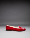 Dark red velvet shoes with embroidered shield in matching lurex 