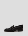 Black leather moccasins