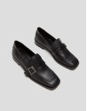 Black leather moccasins