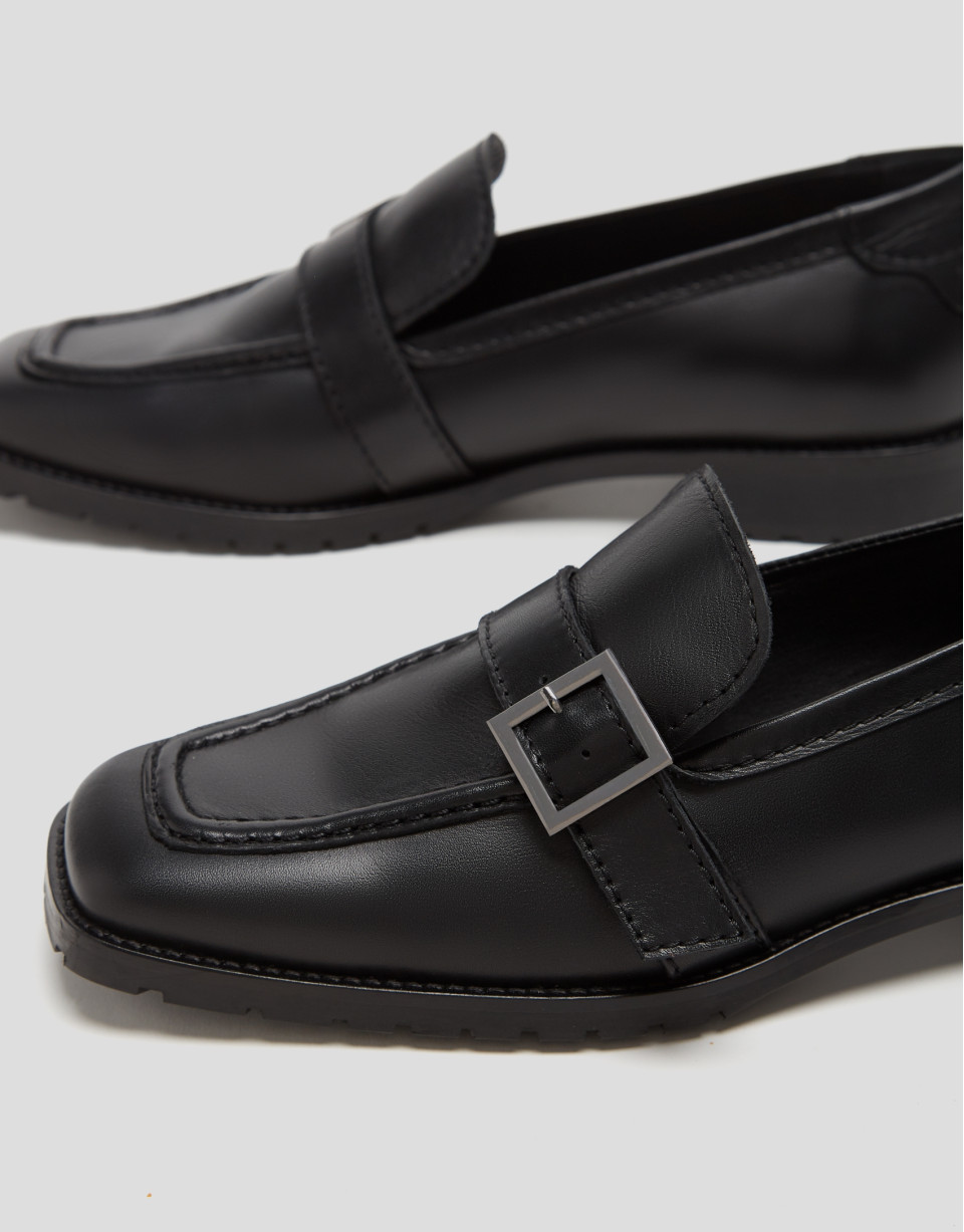 Black leather moccasins