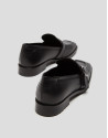 Black leather moccasins