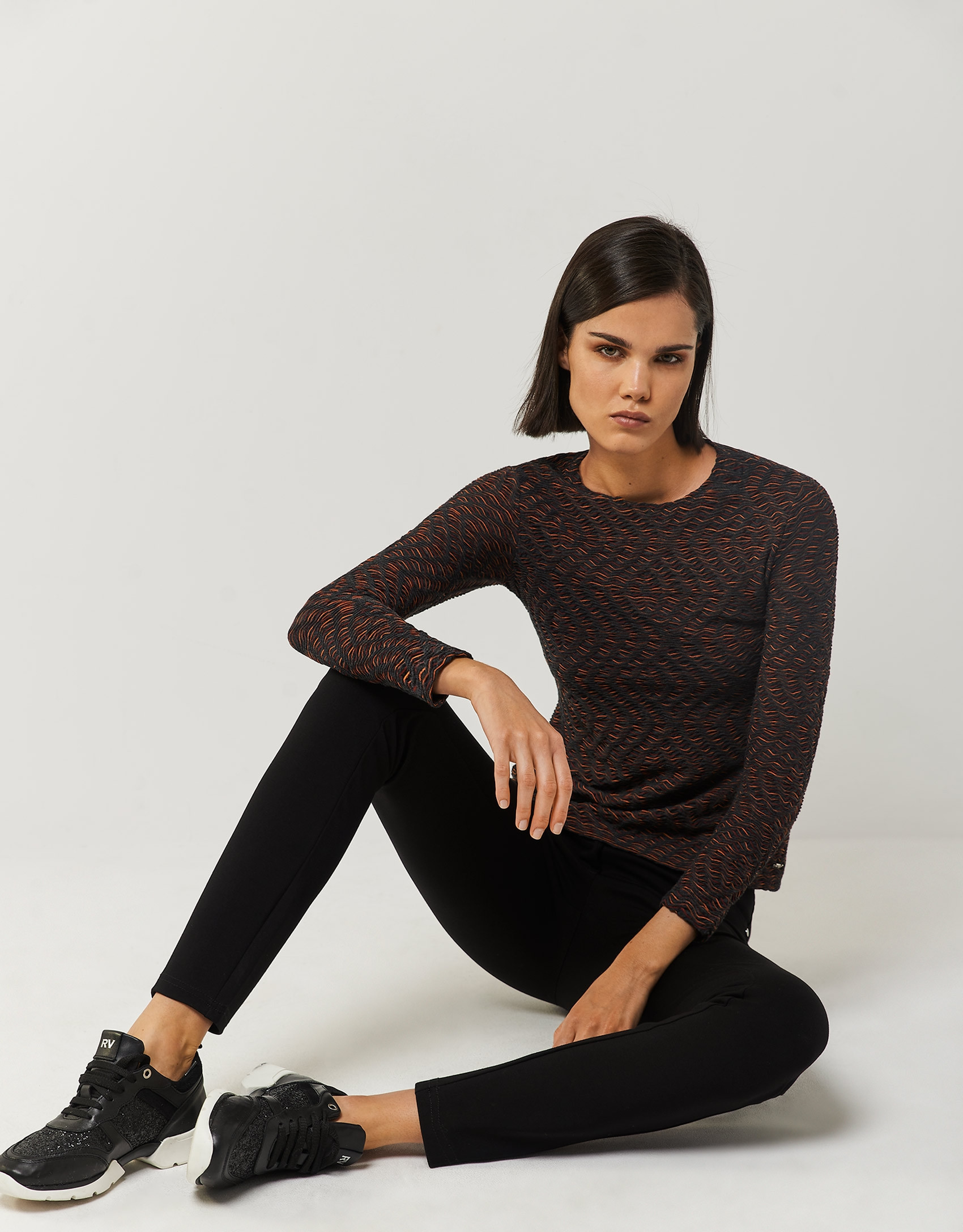 Orange knit top with gray and camel touches | Roberto Verino