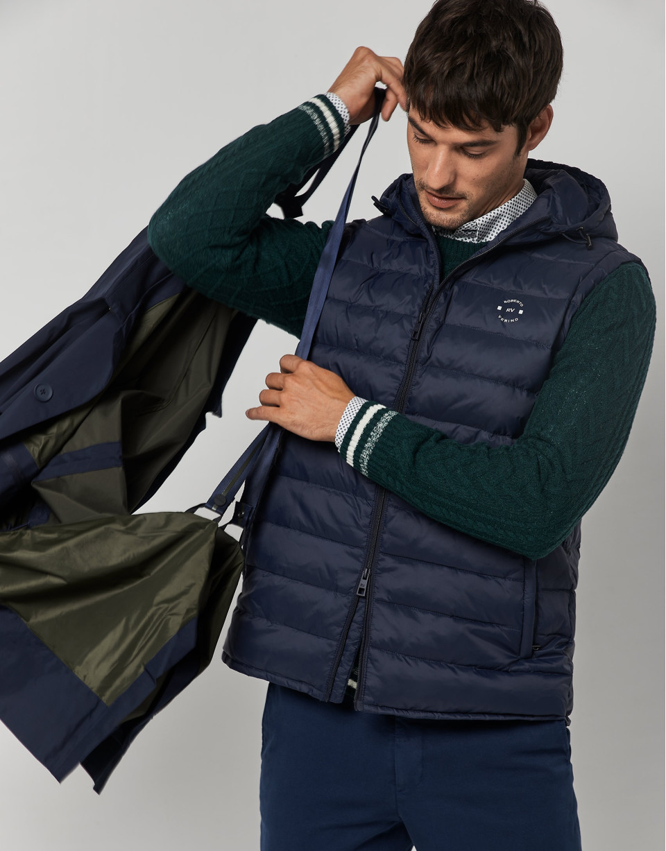 Navy blue tech fabric raincoat with blue quilted vest