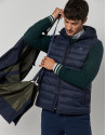 Navy blue tech fabric raincoat with blue quilted vest