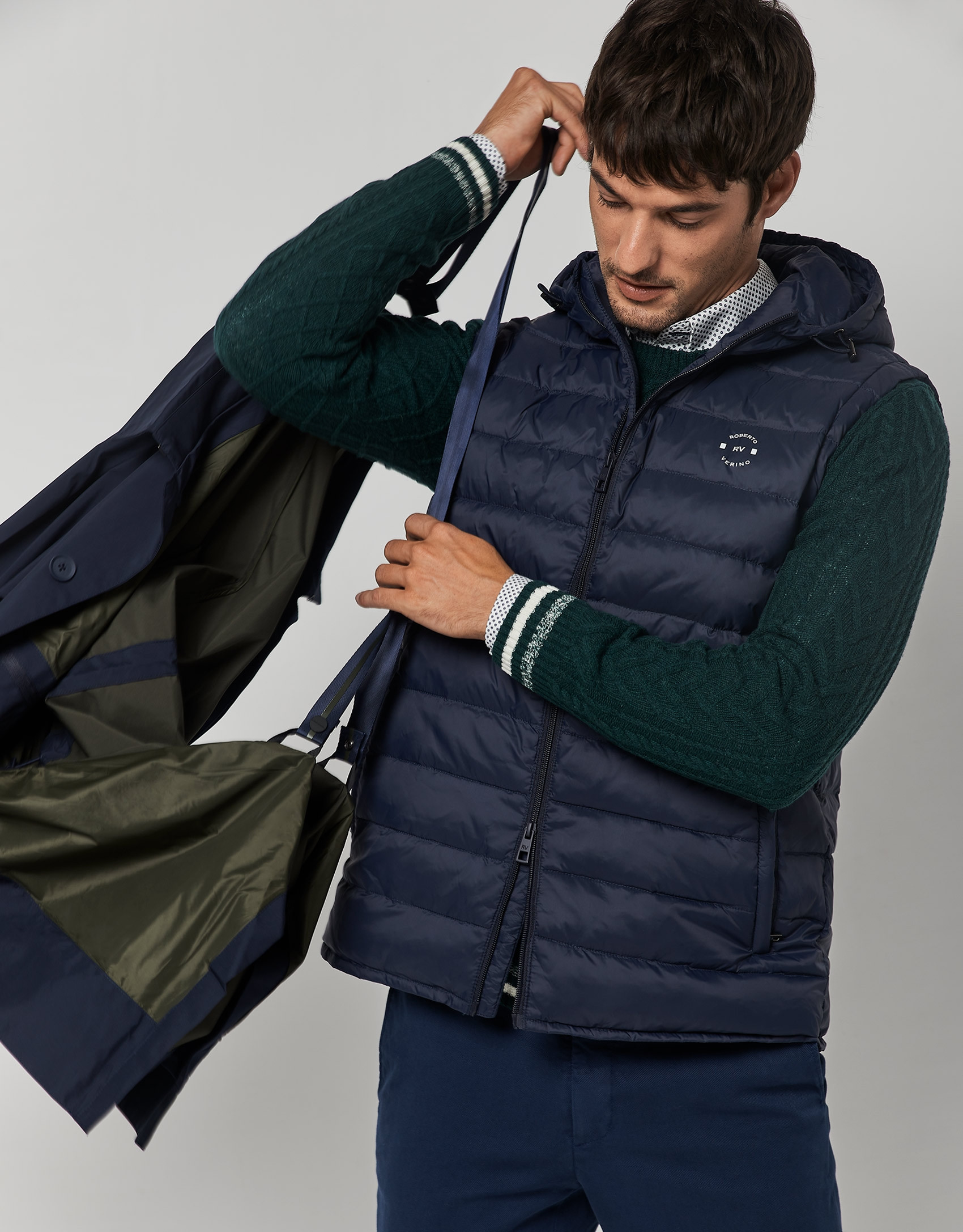 Navy blue tech fabric raincoat with blue quilted vest