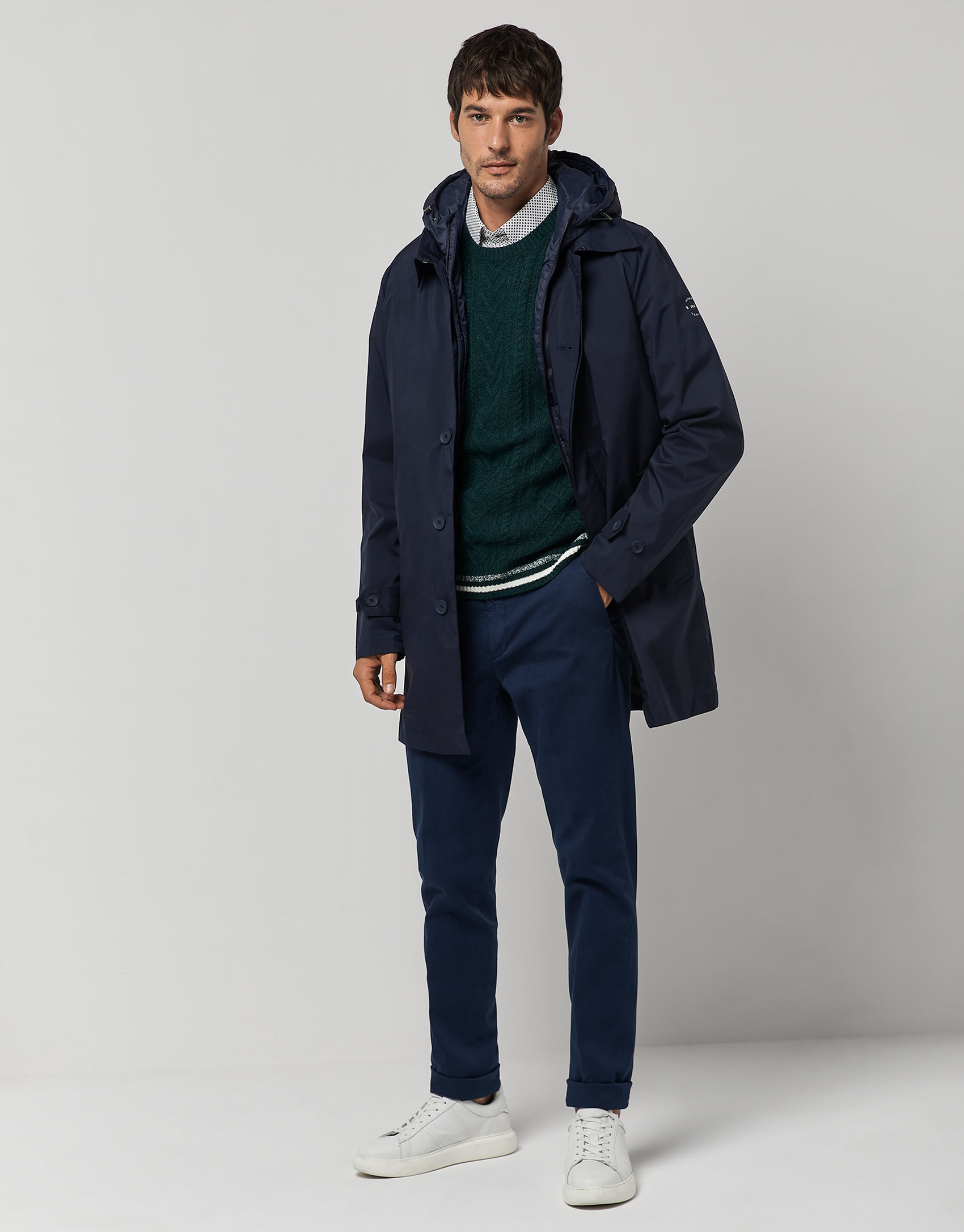 Navy blue tech fabric raincoat with blue quilted vest