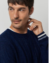 Blue cable-knit wool sweater with stripes on the cuffs