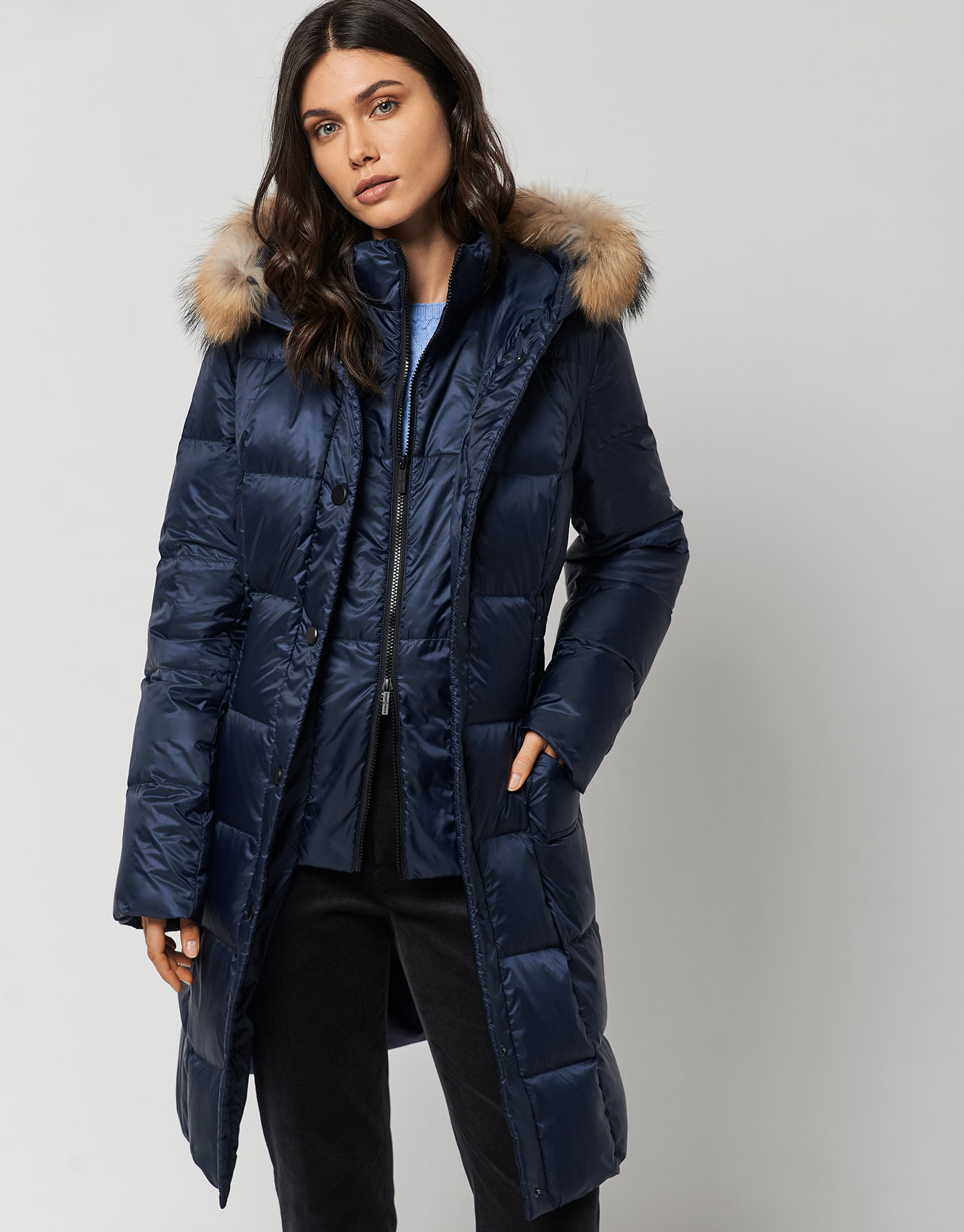 Long dark blue quilted coat with fur hood | Roberto Verino