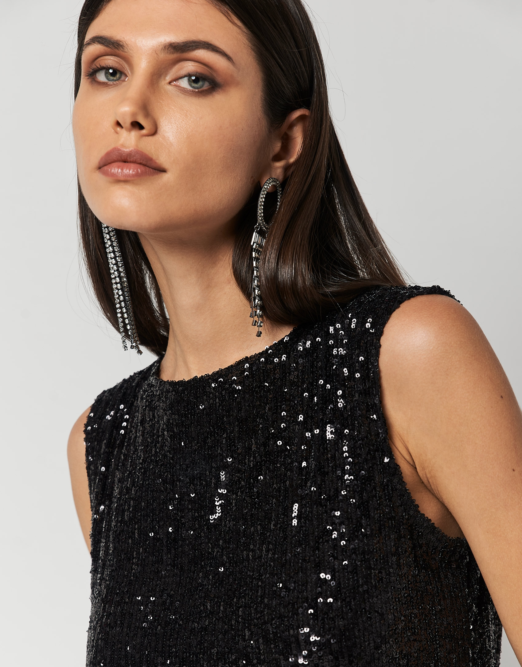 Short black sequined jumpsuit
