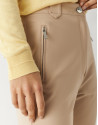 Cream colored fitted pants with zippered pockets | Roberto Verino
