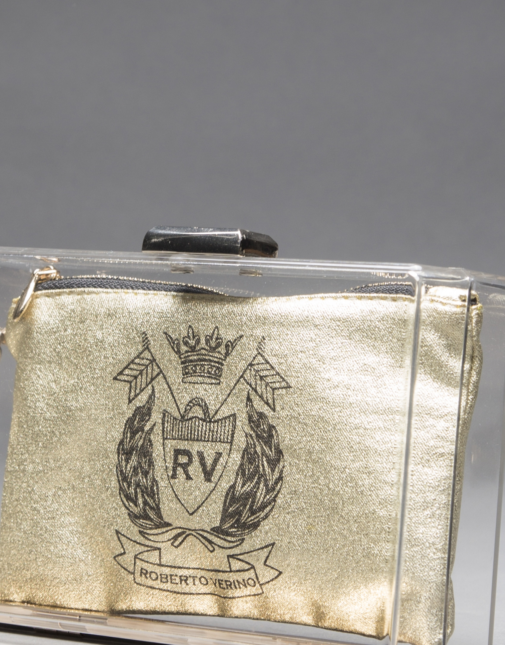 Bolso Diva en vinilo  transparente y monedero en tejido dorado