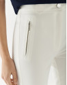Beige colored fitted pants with zippered pockets | Roberto Verino