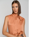 Orange satin knit top with bow - Woman - AW2023 | Roberto Verino
