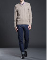 Brown V-neck sweater with cable stitch design