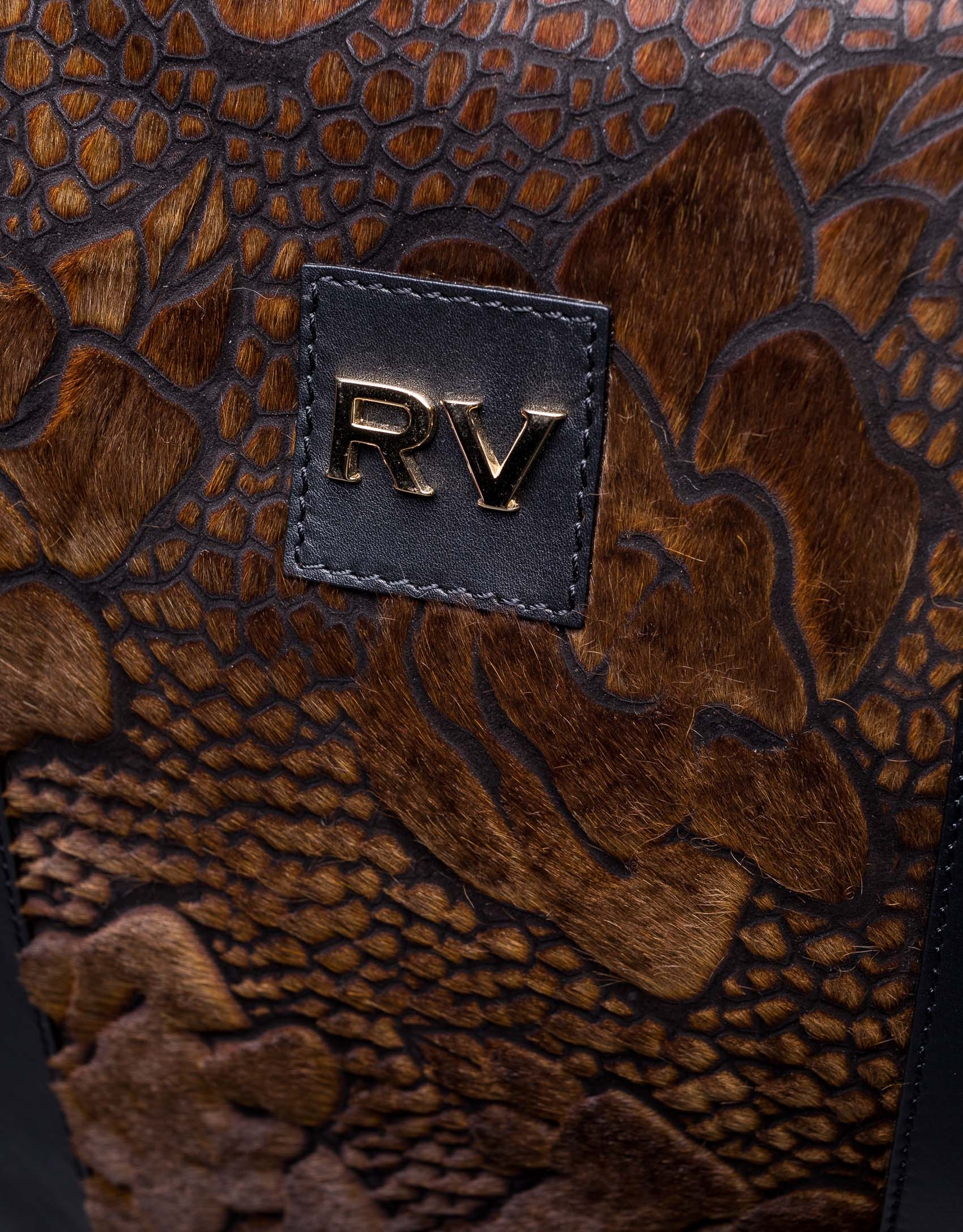 Black napa Orlando Soft bag with embossed brown fantasy fur flower 