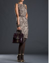 Burgundy leather Rocío Andrómeda bag with embossed snake and  old gold stripe