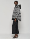 Gray quilted windbreaker with hood and side slits 