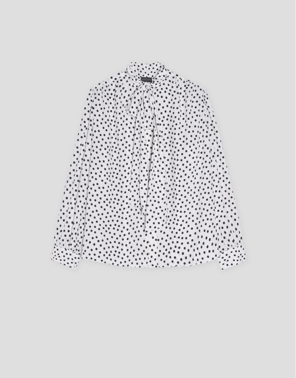 Blusa con lazada estampada topos blanco y negro | Roberto Verino