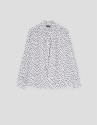 Blusa con lazada estampada topos blanco y negro | Roberto Verino