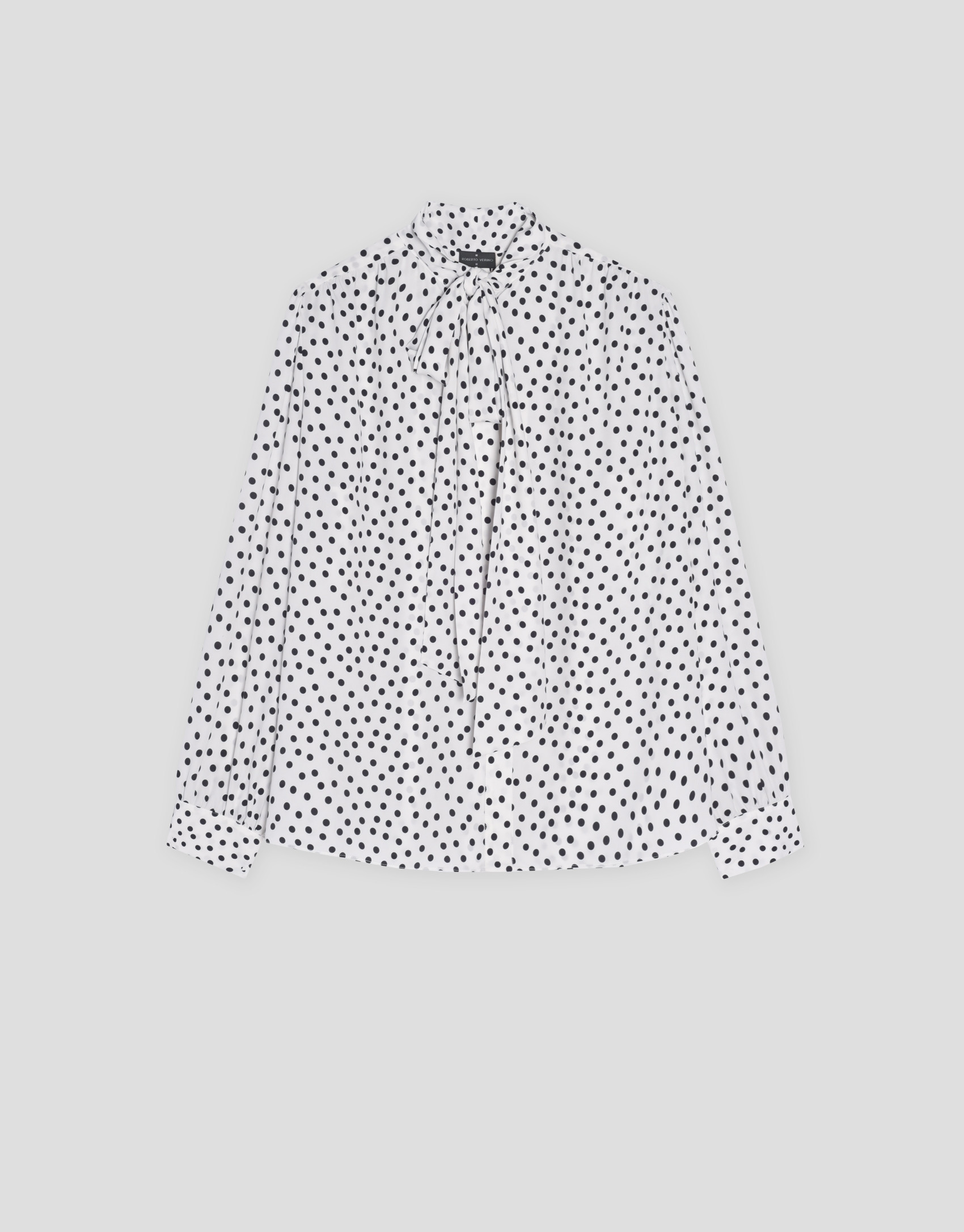Blusa con lazada estampada topos blanco y negro | Roberto Verino