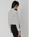 Blouse with bow and black and white dotted print | Roberto Verino